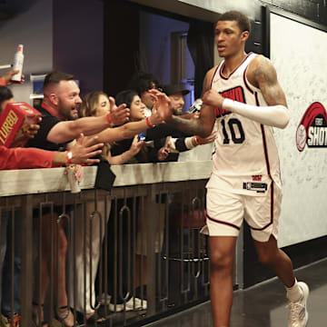 Mar 17, 2025; Houston, Texas, USA; Houston Rockets forward Jabari Smith Jr. (10) celebrates with fans after the game against the Philadelphia 76ers at Toyota Center. Mandatory Credit: Troy Taormina-Imagn Images