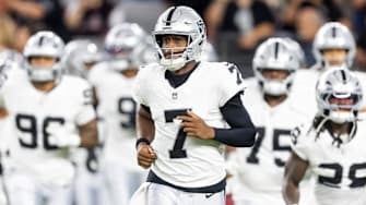 Aug 23, 2025; Glendale, Arizona, USA; Las Vegas Raiders quarterback Geno Smith (7) against the Arizona Cardinals during a preseason NFL game at State Farm Stadium. Mandatory Credit: Mark J. Rebilas-Imagn Images