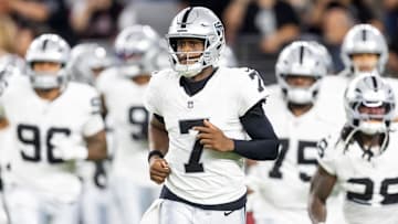 Aug 23, 2025; Glendale, Arizona, USA; Las Vegas Raiders quarterback Geno Smith (7) against the Arizona Cardinals during a preseason NFL game at State Farm Stadium. Mandatory Credit: Mark J. Rebilas-Imagn Images