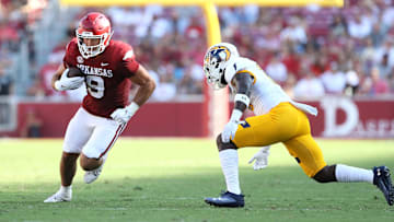 Sep 9, 2023; Fayetteville, Arkansas, USA; Arkansas Razorbacks tight end Luke Hasz (9) runs after a catch during the fourth quarter against the Kent State Golden Flashes at Donald W. Reynolds Razorback Stadium. Arkansas won 28-6. Mandatory Credit: Nelson Chenault-Imagn Images