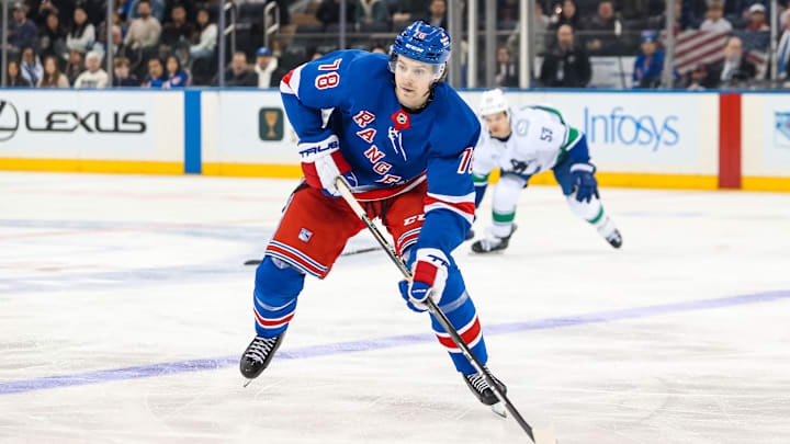 Mar 22, 2025; New York, New York, USA; New York Rangers left wing Brennan Othmann (78) skates against the Vancouver Canucks during the third period at Madison Square Garden. Mandatory Credit: Danny Wild-Imagn Images
