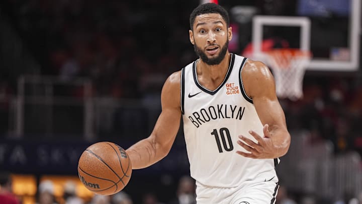 Oct 23, 2024; Atlanta, Georgia, USA; Brooklyn Nets guard Ben Simmons (10) directs teammates while controlling the ball during the first half at State Farm Arena. Mandatory Credit: Dale Zanine-Imagn Images