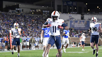 Nov 15, 2025; Durham, North Carolina, USA;  Virginia Cavaliers wide receiver Trell Harris (11) celebrates a touchdown against the Duke Blue Devils in the third quarter at Wallace Wade Stadium. Mandatory Credit: Zachary Taft-Imagn Images