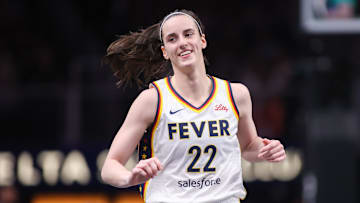 May 22, 2025; Atlanta, Georgia, USA; Indiana Fever guard Caitlin Clark (22) reacts after a basket against the Atlanta Dream in the first half at State Farm Arena. Mandatory Credit: Brett Davis-Imagn Images