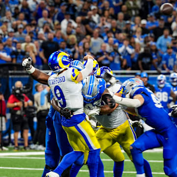 Los Angeles Rams quarterback Matthew Stafford (9) is rushed by Detorit Lions defense during the second half of the Detroit Lions season opener against the Los Angeles Rams at Ford Field in Detroit, on Sunday, Sept. 8. 2024.