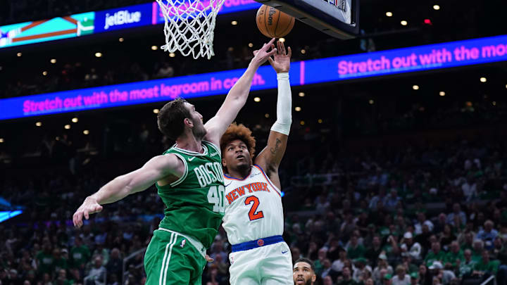 Oct 22, 2024; Boston, Massachusetts, USA; New York Knicks guard Miles McBride (2) shoots against Boston Celtics center Luke Kornet (40) in the second half at TD Garden. Mandatory Credit: David Butler II-Imagn Images Oct 22, 2024; Boston, Massachusetts, USA; New York Knicks guard Miles McBride (2) shoots against Boston Celtics center Luke Kornet (40) in the second half at TD Garden. Mandatory Credit: David Butler II-Imagn Images