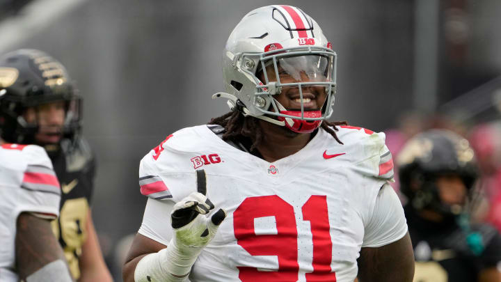 Oct. 14, 2023; Lafayette, In., USA; 
Ohio State Buckeyes defensive tackle Tyleik Williams (91) celebrates after making a tackle during the first half of Saturday's NCAA Division I football game against the Purdue Boilermakers at Ross-Ade Stadium in Lafayette.