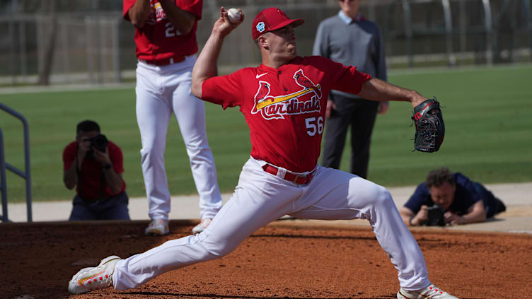 Feb 18, 2023; Jupiter, FL, USA;  St. Louis Cardinals relief pitcher Ryan Helsley (56) warms up