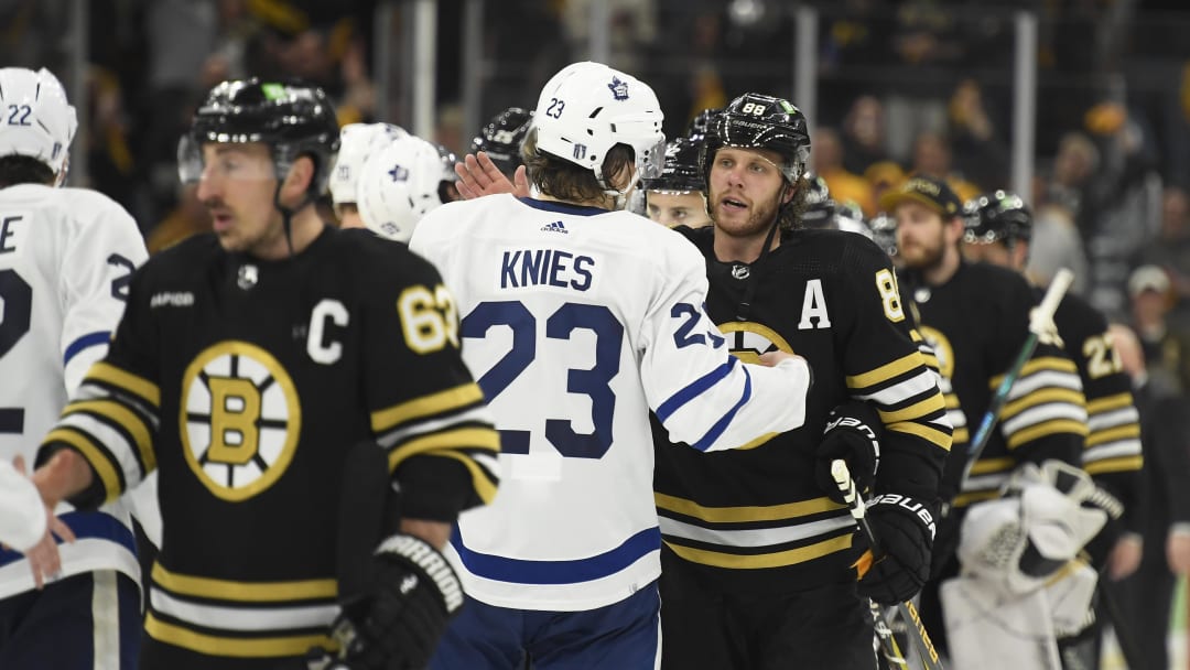 May 4, 2024; Boston, Massachusetts, USA; Toronto Maple Leafs left wing Matthew Knies (23) and Boston Bruins right wing David Pastrnak (88) speak after the Bruins defeated the Leafs in overtime in game seven of the first round of the 2024 Stanley Cup Playoffs at TD Garden. Mandatory Credit: Bob DeChiara-USA TODAY Sports