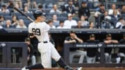 May 17, 2024; Bronx, New York, USA;  New York Yankees center fielder Aaron Judge (99) hits a solo home run.