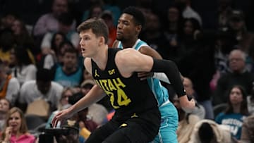 Jan 27, 2024; Charlotte, North Carolina, USA; Utah Jazz center Walker Kessler (24) on defense