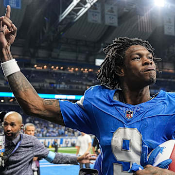 Detroit Lions wide receiver Jameson Williams (9) waves at fans to celebrates 26-20 overtime win over Los Angeles Rams as he exits the field at Ford Field in Detroit on Sunday, September 8, 2024.