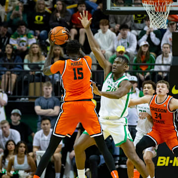 Oregon center Mahamadou Diawara guards Oregon State center Chol Marial as the Oregon Ducks host the Oregon State Beavers Wednesday, Feb. 28, 2024 at Matthew Knight Arena in Eugene, Ore.