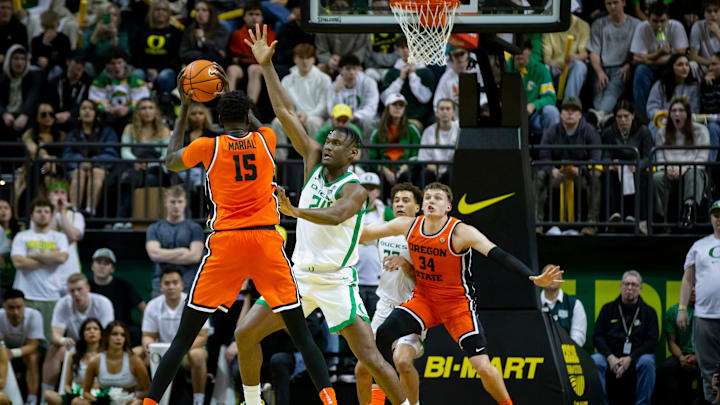 Oregon center Mahamadou Diawara guards Oregon State center Chol Marial as the Oregon Ducks host the Oregon State Beavers Wednesday, Feb. 28, 2024 at Matthew Knight Arena in Eugene, Ore.