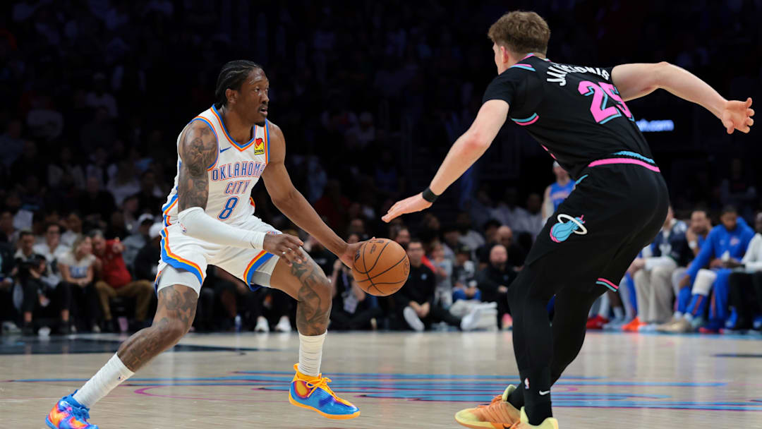 Jan 17, 2026; Miami, Florida, USA; Oklahoma City Thunder guard Jalen Williams (8) drives to the basket against Miami Heat guard Kasparas Jakucionis (25) during the first quarter at Kaseya Center. Mandatory Credit: Sam Navarro-Imagn Images