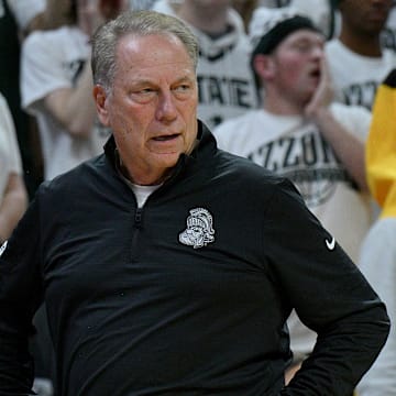 Nov 8, 2025; East Lansing, Michigan, USA;  Michigan State Spartans head coach Tom Izzo watches his squad against Arkansas during the first half at Jack Breslin Student Events Center. Mandatory Credit: Dale Young-Imagn Images