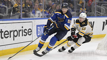 Apr 2, 2023; St. Louis, Missouri, USA; Boston Bruins left wing Tyler Bertuzzi (59) pressures St. Louis Blues defenseman Colton Parayko (55) during the first period at Enterprise Center. Mandatory Credit: Jeff Le-Imagn Images