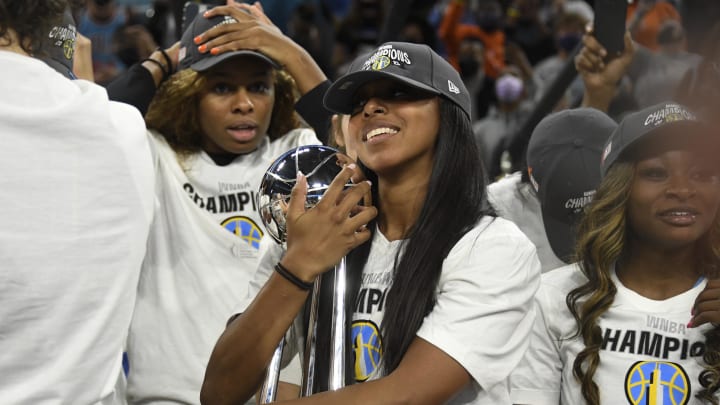 Oct 17, 2021; Chicago, Illinois, USA; Chicago Sky's Lexie Brown holds the championship trophy after the Chicago Sky beat the Phoenix Mercury 80-74 in game four of the 2021 WNBA Finals at Wintrust Arena.