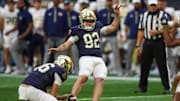 Oct 19, 2024; Atlanta, Georgia, USA; Notre Dame Fighting Irish place kicker Zac Yoakam (92) kicks a field goal against the Georgia Tech Yellow Jackets in the fourth quarter at Mercedes-Benz Stadium.