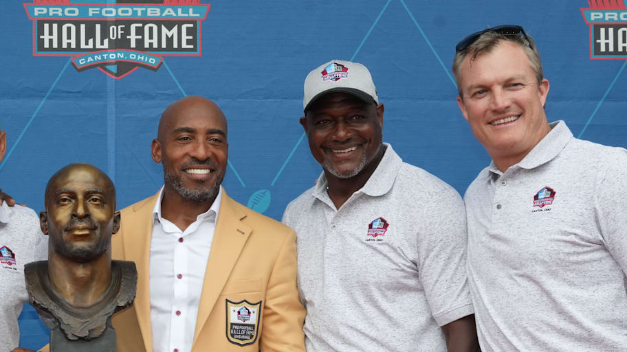 Tampa Bay Buccaneers former cornerback Ronde Barber poses with his bust along with Warren Sapp, Derrick Brooks and John Lynch. | Kirby Lee-Imagn Images