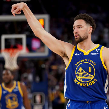 Apr 2, 2024; San Francisco, California, USA; Golden State Warriors guard Klay Thompson (11) reacts after making a three point basket against the Dallas Mavericks in the fourth quarter at the Chase Center. Mandatory Credit: Cary Edmondson-USA TODAY Sports