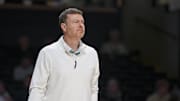 Nov 3, 2025; Nashville, Tennessee, USA;  Vanderbilt Commodores head coach Mark Byington watches against the Lipscomb Bisons during the second half at Memorial Gymnasium. Mandatory Credit: Steve Roberts-Imagn Images