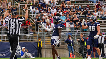 Sep 28, 2024; East Hartford, Connecticut, USA; Connecticut Huskies wide receiver Skyler Bell (1) reacts after his third touchdown against the Buffalo Bulls at Rentschler Field at Pratt & Whitney Stadium. Mandatory Credit: David Butler II-Imagn Images