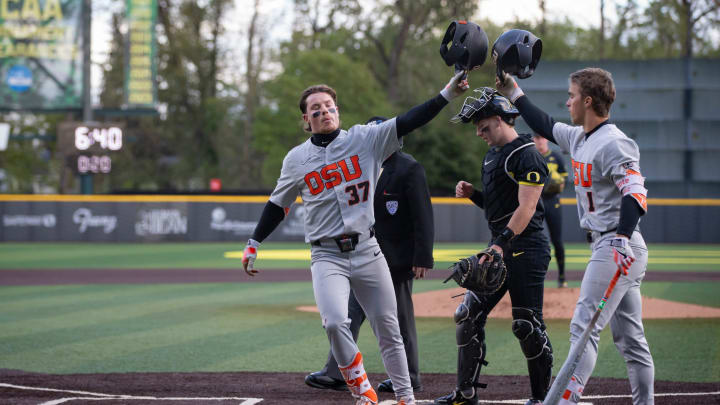 Oregon State infielder Travis Bazzana celebrates with Oregon State outfielder Gavin Turley after Bazzana hit a home run as the Oregon Ducks host the Oregon State Beavers Tuesday, April 30, 2024, at PK Park in Eugene, Ore.