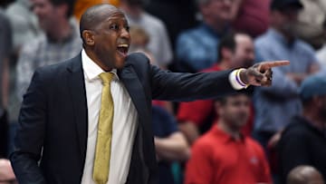 Mar 13, 2024; Nashville, TN, USA; Missouri Tigers head coach Dennis Gates yells from the bench during the second half against the Georgia Bulldogs at Bridgestone Arena. Mandatory Credit: Christopher Hanewinckel-Imagn Images