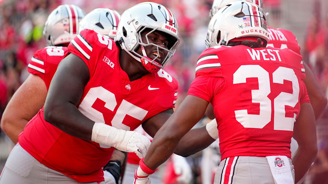 Ohio State Buckeyes offensive lineman Justin Terry (65) celebrates with running back Isaiah West (32) after West scored a touchdown in the second half of the NCAA football game at the Ohio Stadium on Saturday, Sept. 6, 2025 in Columbus, Ohio.