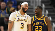 Jan 27, 2024; San Francisco, California, USA; Los Angeles Lakers forward Anthony Davis (3) and Golden State Warriors forward Draymond Green (23) talk during the third quarter at Chase Center. Mandatory Credit: Darren Yamashita-Imagn Images