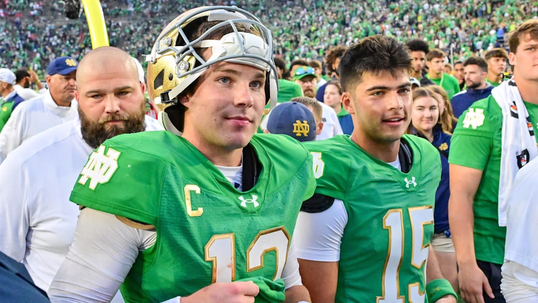 Sep 28, 2024; South Bend, Indiana, USA; Notre Dame Fighting Irish quarterback Riley Leonard (13) leaves the field after defeating the Louisville Cardinals at Notre Dame Stadium. Mandatory Credit: Matt Cashore-Imagn Images