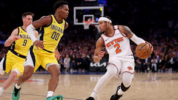May 21, 2025; New York, New York, USA; New York Knicks guard Miles McBride (2) controls the ball against Indiana Pacers guard Bennedict Mathurin (00) in the third quarter during game one of the eastern conference finals for the 2025 NBA Playoffs at Madison Square Garden. Mandatory Credit: Brad Penner-Imagn Images