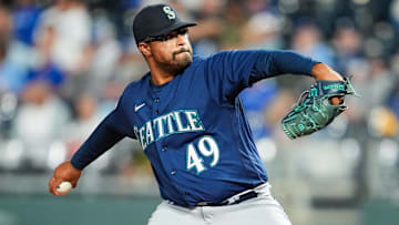 Aug 14, 2023; Kansas City, Missouri, USA; Seattle Mariners relief pitcher Isaiah Campbell (49) pitches during the seventh inning against the Kansas City Royals at Kauffman Stadium. Mandatory Credit: Jay Biggerstaff-Imagn Images
