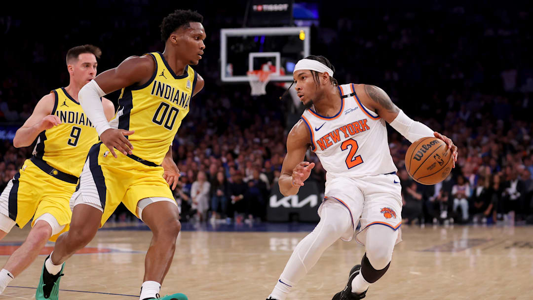 May 21, 2025; New York, New York, USA; New York Knicks guard Miles McBride (2) controls the ball against Indiana Pacers guard Bennedict Mathurin (00) in the third quarter during game one of the eastern conference finals for the 2025 NBA Playoffs at Madison Square Garden. Mandatory Credit: Brad Penner-Imagn Images