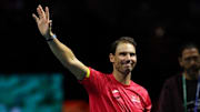 Rafael Nadal waves to the crowd as he retires from tennis at the Davis Cup.