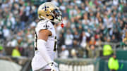 Jan 1, 2023; Philadelphia, Pennsylvania, USA; New Orleans Saints cornerback Marshon Lattimore (23) celebrates his interception return for a touchdown during the fourth quarter against the Philadelphia Eagles at Lincoln Financial Field. Mandatory Credit: Eric Hartline-Imagn Images