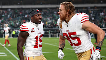 San Francisco 49ers wide receiver Deebo Samuel (L) and tight end George Kittle (R)