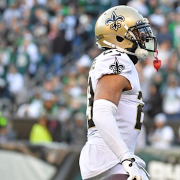 Jan 1, 2023; Philadelphia, Pennsylvania, USA; New Orleans Saints cornerback Marshon Lattimore (23) celebrates his interception return for a touchdown during the fourth quarter against the Philadelphia Eagles at Lincoln Financial Field. Mandatory Credit: Eric Hartline-Imagn Images