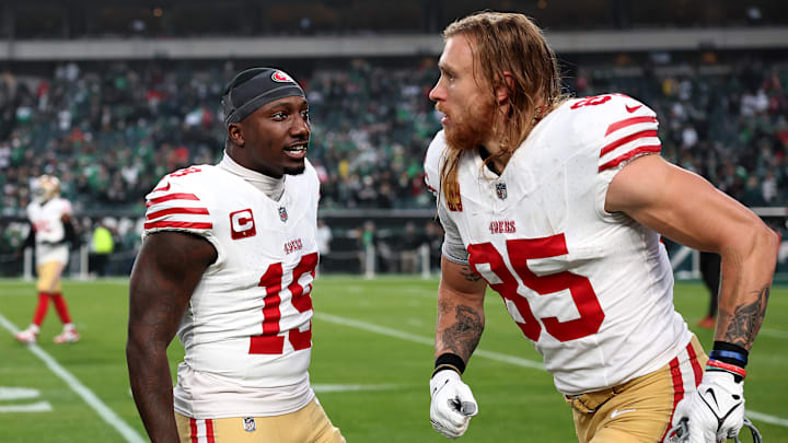 San Francisco 49ers wide receiver Deebo Samuel (L) and tight end George Kittle (R)