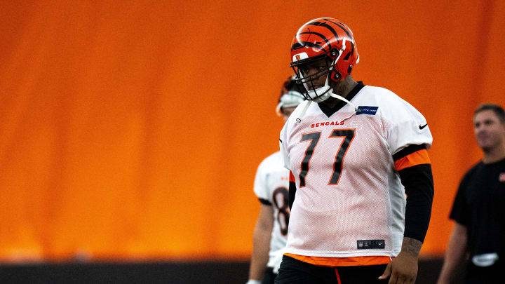 Cincinnati Bengals offensive tackle Trent Brown (77) walks to the line for field goal practice at Bengals spring practice at the IEL Indoor Facility in Cincinnati on Wednesday, June 12, 2024.