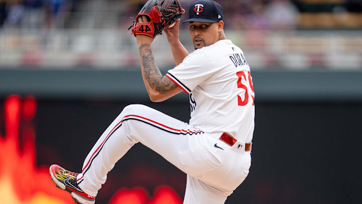 May 24, 2025; Minneapolis, Minnesota, USA; Minnesota Twins pitcher Jhoan Duran (59) warms up to face the Kansas City Royals in the ninth inning at Target Field.