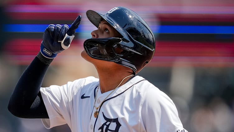 Gio Urshela points skyward in a game between the Kansas City Royals and Detroit Tigers