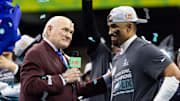 Fox Sports announcer Terry Bradshaw interviews Philadelphia Eagles quarterback Jalen Hurts after Super Bowl LIX. 