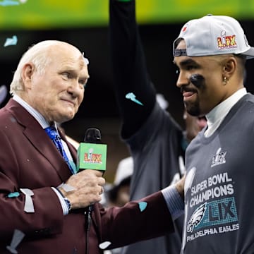 Fox Sports announcer Terry Bradshaw interviews Philadelphia Eagles quarterback Jalen Hurts after Super Bowl LIX. 