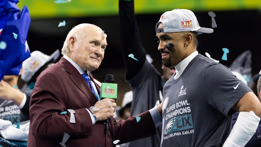 Fox Sports announcer Terry Bradshaw interviews Philadelphia Eagles quarterback Jalen Hurts after Super Bowl LIX.  | Mark J. Rebilas-Imagn Images