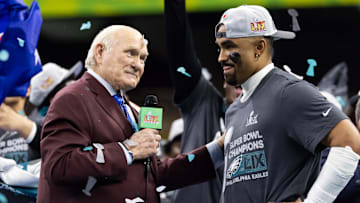 Fox Sports announcer Terry Bradshaw interviews Philadelphia Eagles quarterback Jalen Hurts after defeating the Kansas City Chiefs during Super Bowl LIX at Ceasars Superdome. 