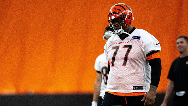 Cincinnati Bengals offensive tackle Trent Brown (77) walks to the line for field goal practice at Bengals spring practice at the IEL Indoor Facility in Cincinnati on Wednesday, June 12, 2024.