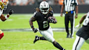 Aug 16, 2025; Paradise, Nevada, USA; Raiders running back Ashton Jeanty (2) rushes against the San Francisco 49ers during the first quarter at Allegiant Stadium. Mandatory Credit: Stephen R. Sylvanie-Imagn Images