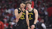May 4, 2025; Houston, Texas, USA; Golden State Warriors guard Stephen Curry (30) and guard Brandin Podziemski (2) talk during a timeout during game seven of first round for the 2025 NBA Playoffs against the Houston Rockets at Toyota Center. Mandatory Credit: Troy Taormina-Imagn Images